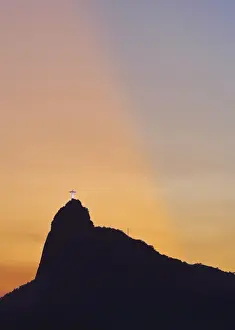 Sunset view of Christ the Redeemer statue and Corcovado Mountain, Rio de Janeiro