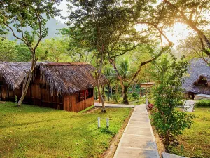 Glow Prints: Sunset view at Hostal Oasis The Traveler in Lanquin