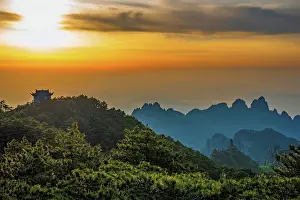 Province Prints: Sunset view from Huangshan showcasing mountains and ancient structures in Anhui Province