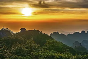 Province Prints: Sunset view over Huangshan showcasing mountains and trees in Anhui Province, China