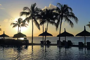 Silhouettes Prints: Sunset view from Le Meridien Ile Maurice Resort overlooking the water in Pointe aux Piments