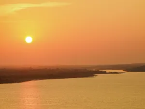 Lookout Prints: Sunset view from Mirador Rey Canek over Lake Peten Itza in San Miguel