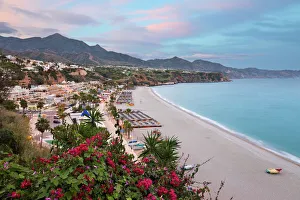 Andalucia Prints: Sunset view over Nerja Playa Burriana beach, Nerja, Malaga Province, Costa del Sol