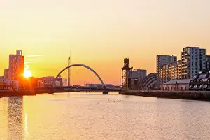 Clyde Prints: Sunset view over River Clyde featuring Clyde Arc and Squinty Bridge in Glasgow, Scotland