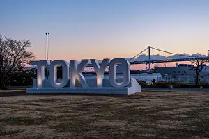 Tokyo Prints: Sunset view of Tokyo‚Äôs iconic waterfront with large TOKYO sign in Odaiba