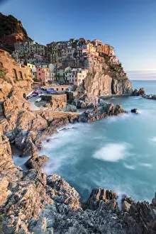 Cinque Terre Prints: Sunset in the village of Manarola with its pastel coloured houses and its cosy dock