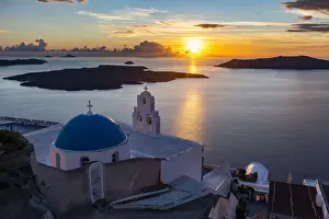 Places Of Worship Prints: Sunset over the volcanic islands of Santorini and Anastasi Orthodox Church at sunset