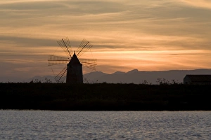 Trapani Prints: Sunset over windmill on salt beds, Trapani, Sicily, Italy, Mediterranean, Europe