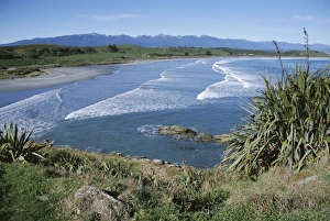 Surf rolling onto deserted beaches