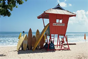 Bali Prints: Surfboards stacked waiting for hire at Kuta beach on