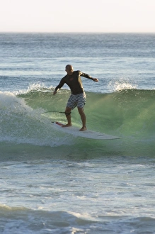 Surfer at Arrifana beach