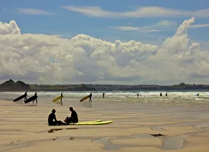 Sport Prints: Surfers with boards on Perranporth beach, Cornwall, England