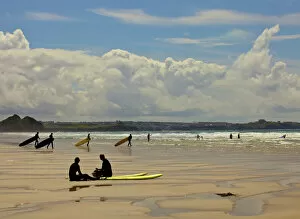 Holidays Gallery: Surfers with boards on Perranporth beach, Cornwall, England