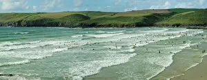 Cornwall Collection: Surfers at Polzeath, Hayle Bay and the Cornish coast, Cornwall, England