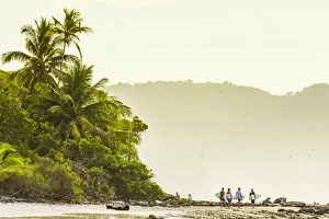 Nicoya Peninsula Prints: Surfers strolling on the beach at this hip southern Nicoya Peninsula surf resort