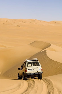 SUV on sand dunes