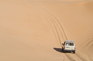 SUV on sand dunes