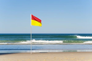 Queens Land Prints: Swimming flag for satefy at Surfers Paradise beach