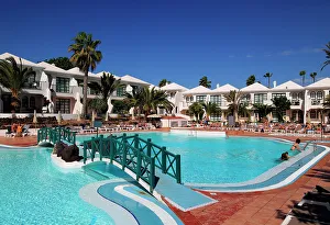 Chairs Prints: Swimming pool at H10 Ocean Suites hotel in Corralejo