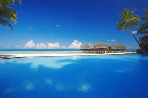 Beach Huts Prints: Swimming pool, palms and beach huts, Maldives, Indian Ocean, Asia