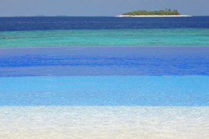 Swimming pool and tropical island, Maldives, Indian Ocean, Asia
