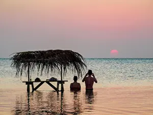 Enjoyment Prints: Swing Bar at sunset, Secret Beach, Ambergris Caye, Belize District, Belize