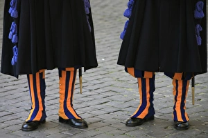 Uniform Prints: Swiss guards and sanpietrini paving stones, Vatican, Rome, Lazio, Italy, Europe