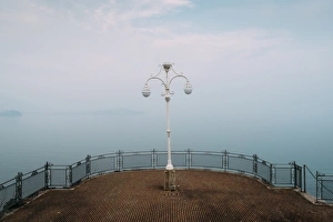 Piedmont Prints: A symmetrical spot with a lamp overlooking Lake Maggiore, Piedmont, Italian Lakes