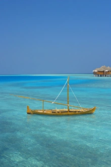 Images Dated 8th February 2009: Taditional dhoni and water villas, Maldives, Indian Ocean, Asia
