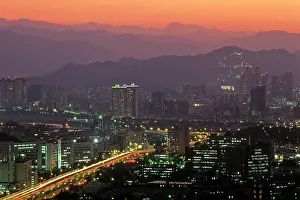 Taipei Prints: Taipei skyline shows city lights and mountains as dusk settles in East Asia