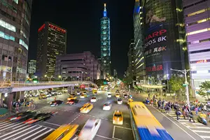 Taipei Prints: Taiwan, Taipei, traffic in front of Taipei 101 at a busy downtown intersection in