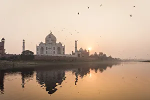 Indian Culture Gallery: Taken from a boat on the River Yamuna behind the Taj Mahal at sunset, UNESCO World