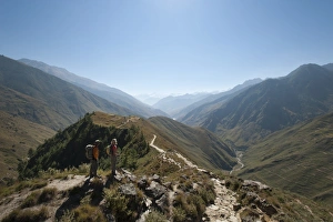 Trekkers Prints: Taking a pause from the trail at a viewpoint in the Juphal Valley, Nepal, Himalayas, Asia