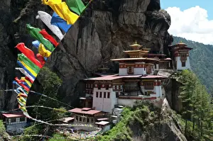 Forts Prints: Taktshang Goemba (Tigers nest monastery) with prayer flags and cliff