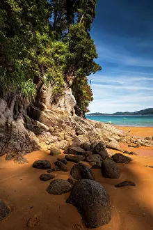 Passage Prints: Tall Cliffs and Golden Sand in Narrow Coastal Passage