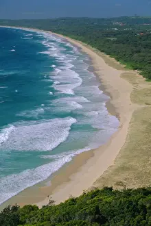 Popular Prints: Tallow Beach from Cape Byron, a popular surfing spot east of the resort of Byron Bay in north east NSW