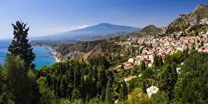 Taormina and Mount Etna Volcano seen from Teatro Greco (Greek Theatre), Taormina, Sicily, Italy, Mediterranean, Europe