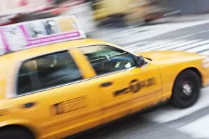 Taxi cab in Times Square, Midtown, Manhattan, New York City, New York, United States of America
