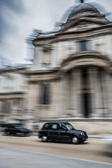 Taxi Prints: Taxi going past St. Pauls Cathedral, London, England, United Kingdom, Europe