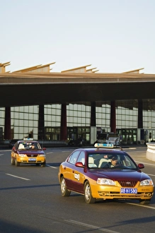 Taxis leaving Beijing Capital Airport part of new Terminal 3 building opened February 2008 Taxis leaving Beijing Capital Airport part of new Terminal 3 building opened February 2008