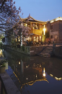 Images Dated 12th April 2009: Teahouse at dusk along canal, Suzhou, Jiangsu, China, Asia