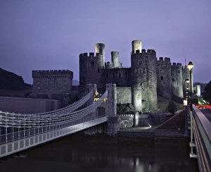 Conwy Prints: Telford Suspension Bridge at dusk, crossing the River Conwy, leading to Conwy Castle