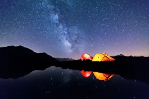 Graian Alps Prints: Tents reflected in the alpine lake on a starry night, Mont De La Saxe, Courmayeur
