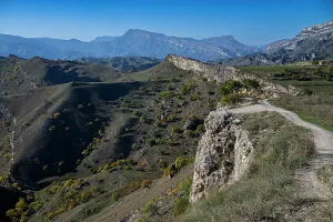 Peaks Prints: Terraced fields in Dagestan show the resilience of agriculture in mountain regions of Russia under clear blue sky