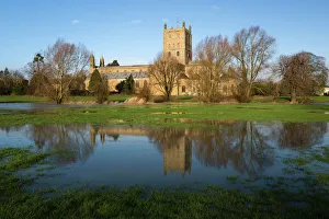 Meadow Prints: Tewkesbury Abbey reflected in flooded meadow, Tewkesbury, Gloucestershire, England