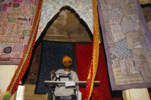 Jaisalmer Prints: Textile worker at his sewing machine