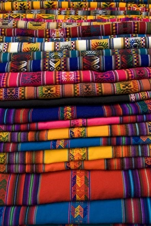Images Dated 30th December 2005: Textiles for sale in the market in the village of Pisac, The Sacred Valley
