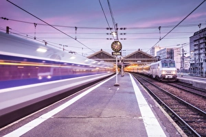 Centre Prints: A TGV high speed train leaves the train station in Tours, Indre et Loire, Centre