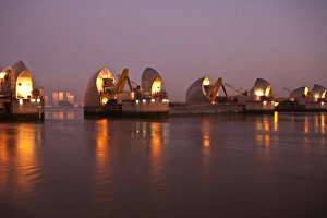 Woolwich Prints: Thames Barrier and Canary Wharf at dawn, London, England, United Kingdom, Europe