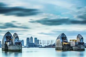 Typically English Gallery: Thames Barrier on River Thames and Canary Wharf in the background, London, England